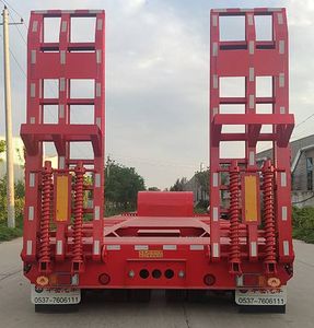 Huayue Xing brand automobiles FNZ9405TDP Low flatbed semi-trailer