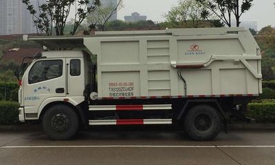 Tongxin  TX5120ZDJ4DF Compressed docking garbage truck