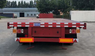 Lu Junda  XCD9401TDP Low flatbed semi-trailer