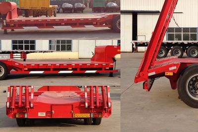 Huayue Xing brand automobiles FNZ9400TDP Low flatbed semi-trailer