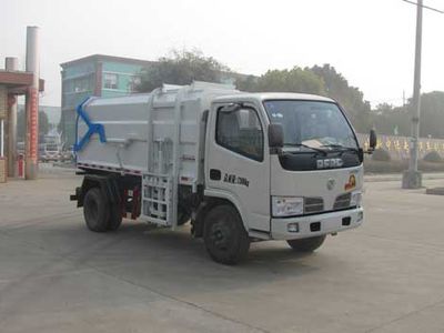 Zhongjie Automobile XZL5071ZDJ4 Compressed docking garbage truck