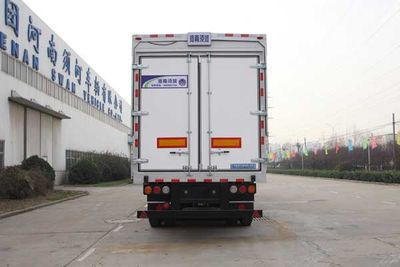 White Bird  HXC9401XYK Wing opening box semi-trailer